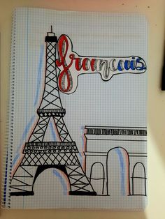 a drawing of the eiffel tower in paris with writing on it and some markers