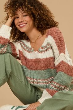 This knit oversized striped sweater combines relaxed fit with bold stripes for a stylish look. Its cozy texture and generous silhouette make it perfect for layering and staying warm. White Dress Skirt, Knit Oversized Sweater, Cozy Texture, Oversized Striped Sweater, Christmas Skirt, Skirts With Boots, Oversized Knitted Sweaters, Winter Layering, Bold Stripes