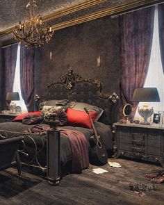 a bed room with a neatly made bed next to two night stands and a chandelier