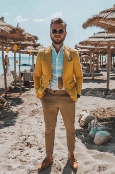 👉 Break Free from the Ordinary: Click the Link to Find Items and Other Outfits that Redefine Cool 👈  ///// Stylish yellow suit with striped pants, perfect for a wedding guest at a summer beach event. Yellow Beach Outfit Men, Tropical Yellow Tie-side Swimwear, Yellow Suit, Linen Suits, Guest Attire