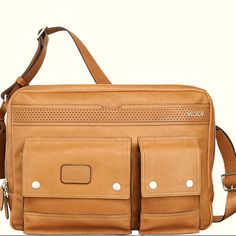 a tan leather messenger bag with two compartments on the front and one compartment in the back