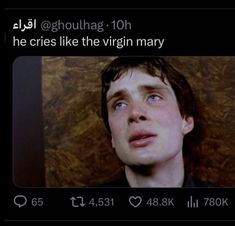 a man is looking up at something in the air with his eyes wide open, and he cries like the virgin mary