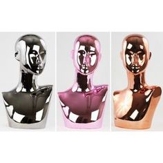 three different colored vases with faces on them in the shape of people's heads