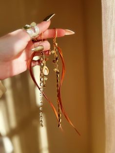 This listing is for a pair of neutral feather earrings embellished with gemstone chain and boho charms. Boho Charms, Dipped Feathers, Earrings Feather, Teal Earrings, Tiered Necklace, Earrings Dangling, Ceramic Necklace, Feather Jewelry, Coral Earrings