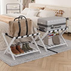 a bed with two suitcases and shoes on it in front of a luggage rack