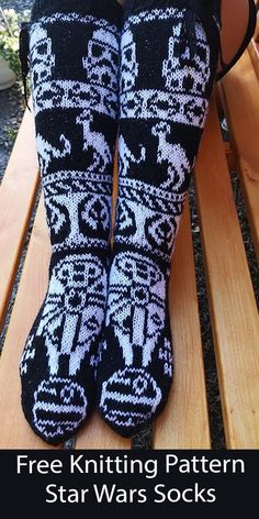 the legs of a woman sitting on a bench wearing black and white knitted socks