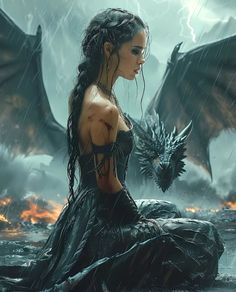 a woman sitting on top of a rock next to a fire and ice dragon in the rain