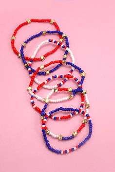 Celebrate Independence Day fourth of July festival and show your love for the USA in style. Each bracelet features multiple layers of vibrant beads in the colors of the American flag, elegantly arranged to create a striking and festive design. The rich hues of red, white, and blue symbolize the unity and strength of the nation, while the addition of gold star charms adds a touch of glamour and sophistication.DIMENSION width: stretchable clasp: Stretchablemetal finish: Gold Platingproduct: Lead & Star Bracelets, Fun Drawings, Beaded Star, Sunglass Chain, A Star Is Born, Festive Design, Faux Leather Belts, Star Bracelet, Gold Star