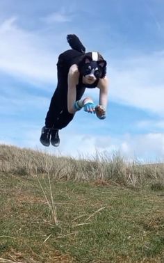 a man is in the air on a skateboard