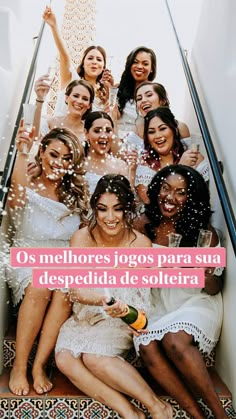 a group of women sitting on top of an escalator with confetti