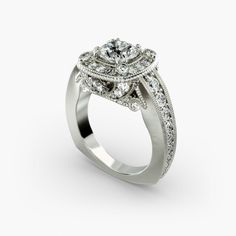 a white gold engagement ring with an intricate design