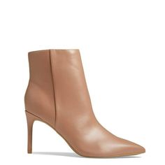 Give your chic fall-ready wardrobe a sophisticated touch in the Nine West Gurly booties. Side zipper closure. Pointed toe silhouette. Classic stiletto heel. Man-made upper. Man-made lining and insole. Man-made outsole. Size: Women 6.5.  Color: Beige.  Gender: female.  Age Group: adult.