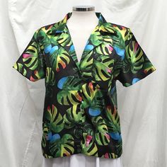 Women's Hawaiian Button-up shirt with Green Floral print. Custom printed Aloha Shirt in vibrant full-color on soft polyester fabric. * 100% Polyester Poplin * Hand Wash with Delicate Soap and Hang Dry Comfortable fitting, short sleeve shirt with a notched lapel and button front. Floral Resort Wear, Tropical Shirt Womens Blouses Summer, Tropical Shirt, Tropical Shirts, Summer Blouses, Aloha Shirt, Lounge Pants, Women's Tops, Floral Printed, Resort Wear