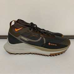 Nike React Pegasus Trail 4 Gore-Tex Sneaker Running Shoes -Size 6 Men’s (7.5 Women’s) -Anthracite/Light Mandarin/Iron Stone -Hit The Ground Running -Low-Profile Design -Pull Tab For Easy Entry -Lace-Up Fastening -Sock-Like Cuff -Signature Nike Branding -React Foam Midsole Provides Ultra-Responsive, Springy Cushioning -Durable Rubber Outsole -Shockwave-Like Pattern Tread -New With Tags -New Without Box Nike Brown Low-top Running Shoes, Nike Brown Functional Sneakers, Functional Brown Running Shoes With Round Toe, Sporty Brown Nike Running Shoes, Brown Running Shoes With Laces, Brown Running Shoes With Boost Midsole And Lace-up, Brown Lace-up Running Shoes, Brown Sneakers With Air Max Cushioning For Outdoor, Brown Functional Running Shoes With Boost Midsole