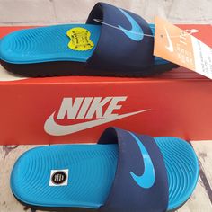 Nike Kawa Slides (Gs/Ps) Midnight Navy/Laser Blue-Black - Kids Multiple Sizes (Sizes 11c/13c). Items Are New In Box With Tags. Items Are In Good Condition. Item: 819352 402 Blue Slides With Branded Insole And Round Toe, Blue Sporty Slides For Streetwear, Sporty Blue Slides For Streetwear, Blue Sporty Slides For Sports, Blue Slip-on Slides For Sports, Blue Sports Slides With Cushioned Footbed, Blue Non-slip Synthetic Slides, Blue Cushioned Slides For Sports, Blue Slides With Cushioned Footbed For Sports