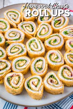 a platter filled with rolls on top of a table