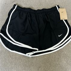 Brand New With Tags Women’s Nike Large Running Shorts. Retail Price $32. Nike Compressive Athletic Shorts For Running, Nike Running Bottoms With Built-in Shorts, Nike Compressive Athletic Shorts, Nike Black Athletic Shorts With Built-in Shorts, Womens Running Shorts, Nike Moisture-wicking Shorts, Running Shorts Women, Womens Running