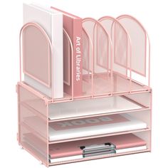 a pink desk organizer with four compartments and two dividers on each side that hold files