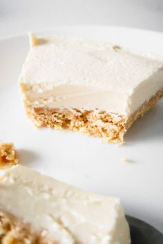 two pieces of cake sitting on top of a white plate