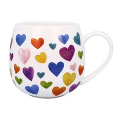 a white coffee cup with multicolored hearts painted on the side and inside it