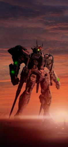 a giant robot standing on top of a field next to a green and white light