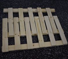 several pieces of wood laid out on the ground