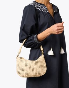 Clare V.'s Moyen bag is sure to be your new go-to. The messenger silhouette is crafted from woven rattan in a neutral cream hue and boasts stunning functional details like interchangeable shoulder and crossbody straps, and a roomy interior to hold all of your essentials. Style yours with ladylike dresses and sleek separates alike to effortlessly complete any look. Ladylike Dress, Clare V, Clare V., The Messenger, Woven Rattan, Messenger Bag, Sleek, Cream, Dresses