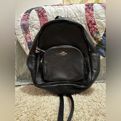 Black Soft Leather Coach Backpack With Gold Accents. Never Been Used. Black Leather Satchel Backpack For Errands, Classic Black Leather Backpack For Errands, Designer Leather Backpack By Coach, Black Leather Backpack For Errands, Designer Coach Leather Backpack, Chic Black Backpack With Leather Backing, Elegant Coach Backpack For Travel, Black Leather Standard Backpack, Designer Black Leather Backpack For Everyday Use