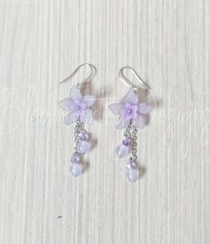 Lilac flower earrings, embellished with matching excellent quality crystal beads, and cute drop dangles, on surgical steel earwires SHIPPING TIMES Please buy ONLY if you are willing to wait according to these estimated times below! Otherwise, please purchase the EXPRESS SHIPPING option at CHECKOUT Singapore: 3-7 business days (default untracked normal mail, free tracked for $50 and above) Asia Pacific: 2-5 weeks Australia, New Zealand and Oceania: 2-5 weeks North America: 4-6 weeks Europe (Non-E Purple Crystal Earrings, Jewelry For Purple Dress, Light Purple Accessories, Purple Flower Earrings, Purple Jewelry Aesthetic, Lavender Accessories, Lilac Accessories, Lilac Clothing, Lilac Jewelry