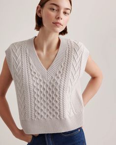 Australian Merino Wool Cable Sweater Vest Merino Wool Sweater In Solid Color With Relaxed Fit, Solid Merino Wool Sweater In Relaxed Fit, Relaxed Fit Merino Wool Sweater, Cozy Merino Wool Top For Layering, Cozy Merino Wool Tops For Layering, Cozy Wool Sweater With Soft Texture, Soft Knit Wool Tops, Classic Beige Wool Sweater Vest, Cozy Merino Wool Knitted Top