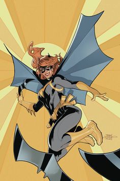 a woman dressed as batgirl flying through the air