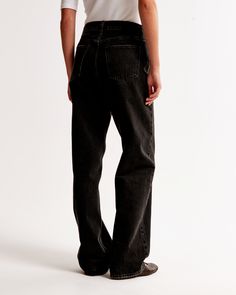 Our new mid rise slouchy jeans in a black wash with a clean hem. This fit features a 9.5” mid rise, is slouchy at the waist and hips, and eases through the thigh into a baggy, full-length leg shape. We recommend buying your true size for a slouchier fit. Size down for a closer fit. This jean is made from our heavyweight rigid denim, a super soft authentic cotton fabric with no stretch. Washed Black Relaxed Fit Mid-rise Jeans, Washed Black Mid-rise Relaxed Fit Jeans, Everyday Washed Black Straight Leg Bottoms, High Rise Washed Black Bottoms For Everyday, Everyday High Rise Washed Black Bottoms, Washed Black High-rise Bottoms For Everyday, Chic Washed Black Bottoms For Everyday, Chic Washed Black Straight Leg Bottoms, Everyday Wide Leg Washed Black Bottoms