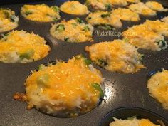 several muffins with cheese and broccoli in a pan