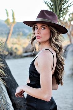 Our love of hats just got became a full-on obsession: meet the Luna Banded Hat in Brown. The most chic, high-end hat we could've ever dreamed up. A hat this good needs to be worn as much as possible and with every single outfit! Hand made by artisans, incredible quality, faux suede, velvet trim around the crown and satin lined. The best part? It's super structured with an elastic band on the inside that will fit EVERYONE. Btw never taking this hat off. These hats are a limited edition. THE HAT:- Chic Curved Brim Hat For Rodeo, Chic Short Brim Rodeo Hat, Chic Boater Hat With Curved Brim For Rodeo, Chic Rodeo Hat, Chic Summer Felt Hat For Rodeo, Chic Curved Brim Panama Hat For Parties, Chic Panama Fedora Hat For Party, Chic Panama Hat Fedora For Party, Chic Party Fedora Panama Hat