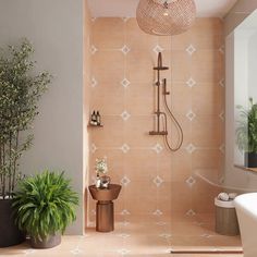 a bath room with a toilet a tub and a plant