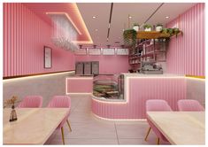 the interior of a restaurant with pink walls and tables, chairs, and counter tops