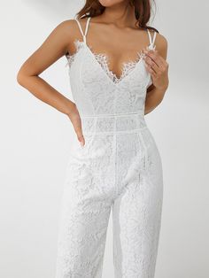 Pattern : pencil pants Type : JUMPSUITS Pant Length(cm) : full length Fabric content : 81% (inclusive) - 90% (inclusive) Release Date : Summer 2022 Thickness : Standard Waist Type : high Age : Ages 35-45 Years Old Length : Ankle-Length Pants Place Of Origin : China (mainland) Fabric Type : Broadcloth Item Type : JUMPSUITS Pattern Type : Solid Gender : WOMEN Style : Casual Model Number : Women Romper Material : POLYESTER Decoration : Lace Fit Type : SKINNY Brand Name : Thefound Women Elegant Jumpsuit, Spaghetti Straps V Neck Solid Color Lace Open Back Wide-leg Jumpsuits Long Playsuit Specification Item Type: Jumpsuit Applicable Gender: Female Applicable Age Range: Adult Fabric: Lace Color: Black/White Pattern: Solid Color, Lace Size: S, M, L, XL Size(cm) S Bust: 84 Length: 143.5 Waist: 68 H White Fitted Jumpsuits And Rompers With Spaghetti Straps, White Fitted Jumpsuit With Spaghetti Straps, White Fitted Strapless Sleeveless Jumpsuit, White Fitted Sleeveless Jumpsuits And Rompers, Fitted Sleeveless White Jumpsuits And Rompers, White Stretch Strapless Sleeveless Jumpsuit, White Stretch Strapless Jumpsuit For Party, White High Waist Fitted Strapless Jumpsuit, White High Waist Jumpsuits And Rompers For Night Out