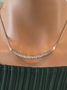 "Wow. This is a lovely vintage 1960's Swarovski crystal necklace in excellent /very good vintage condition. Superb quality with amazing pave work. The rhodium is very clean with very little wear. Necklace is 16\" long with signature and swan logo. Rare find, especially in this condition. Classic style . Would look lovely on a bride, for a special event or ...anywhere. I'd wear this necklace with jeans for fun. ( What's the point of jewelry without having fun? : )" Dazzling Diamond Necklace With Sparkling Stones For Evening, Sterling Silver Rhinestone Necklaces For Evening, Dazzling Crystal Necklaces For Formal Events, Glamorous Silver Rhinestone Necklace For Anniversary, Glamorous Sparkling Rhinestone Necklace For Formal Occasions, Glamorous Sparkling Rhinestone Necklace For Formal Events, Formal Glamorous Sparkling Rhinestone Necklace, Dazzling Sparkling Rhinestone Necklace For Anniversary, Formal Sparkling Diamond Rhinestone Necklace