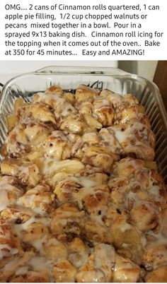 a pan filled with cinnamon rolls covered in icing