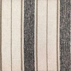 an upholstered area rug with vertical stripes