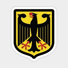 the german coat of arms sticker is shown in black and yellow, with an eagle on