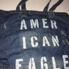 American Eagle Denim Bag Casual Blue Denim Bag, Casual Medium Wash Tote Shoulder Bag, Vintage Denim Bag With Pockets, Everyday Distressed Denim Bag, Casual Medium Wash Cotton Shoulder Bag, Everyday Distressed Denim Blue Bag, Casual Canvas Shoulder Bag In Dark Wash, Casual Dark Wash Canvas Shoulder Bag, Dark Wash Cotton Casual Shoulder Bag