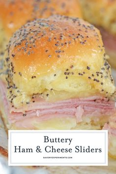 ham and cheese sliders with text overlay that reads, buttery ham and cheese sliders