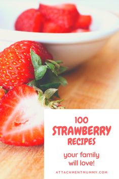 two strawberries in a bowl with the words, 100 strawberry recipes your family will love