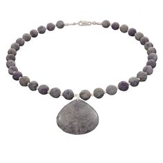 Jasper is a vibrant gemstone that comes in a hundred different variations. This light purple is striking yet gentle. 19 inches long. Properties of this are: Jasper: is the "supreme nurturer," heals the spirit, & brings courage. Silver: calms and brings balance Healing Teardrop Pendant Necklace With Gemstone Beads, Teardrop Amethyst Gemstone Beads Necklaces, Adjustable Teardrop Gemstone Beaded Necklaces, Purple Jasper, Inner Harmony, Jasper Pendant, Jasper Beads, The Supreme, Understated Elegance