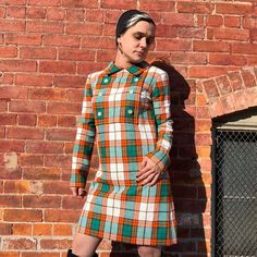 "1960s Plaid Pattern Dress Such a cute plaid dress from the 1960s! Has decorative double breasted buttons on the front and a zipper closure on the back to get in and out of. No size tag - can fit a small to medium.  Measurements: Bust: 37\" Waist: 32\" Hips: 38\" Length: 34\" Shoulder to shoulder: 15\"  Sleeve Length: 22.5\" Armhole opening: 10\" Condition: Good pre-owned condition. Lining is torn at the back. Refer to photo above." Retro Plaid Dress For Work, Retro Plaid Mini Dress, Fitted Retro Plaid Dress For Fall, Plaid Mini Dress, Long Sleeve Velvet Dress, Blue Velvet Dress, Pattern Dress, Dress Medium, Plaid Dress