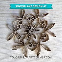 a paper snowflake design is shown on a wooden surface with text overlay