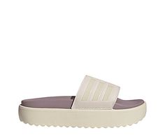 adidas Adilette Platform Womens Slide Sandal Step up your Slide look in the adidas Adilette Platform women s Slide Sandal. With a faux leather upper featuring the 3-Stripes for extra style, this Slide is cool and comfy. The contoured footbed cradles and cushions your foot, while the platform keeps you lifted. Synthetic upper Slip-On Textile liningContoured footbedEVA platform/outsole Adidas Synthetic Sport Sandals For Spring, Adidas Sport Sandals For Spring Sports, Adidas Sandals With Logo, Synthetic Material, Adidas Sporty Sport Sandals For Spring, Sporty Adidas Logo Slides With Open Toe, Sporty Adidas Logo Open Toe Slides, White Adidas Slides With Synthetic Material, Sporty Adidas Sandals In Synthetic Material, Sporty Adidas Sandals With Synthetic Material