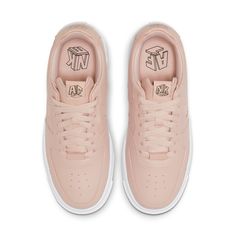 The Nike Women's Air Force 1 'Pixel Particle Beige' is a reconstructed take on Bruce Kilgore's original 1982 design. A soft pink hue is applied to the all-leather upper, updated with a cut-out Swoosh, floating eyestay and exaggerated heel tab. The low-top rides on a contrasting white midsole that adds large pixelated detailing for a distorted aesthetic. Distorted Aesthetic, 1 Pixel, Nike Air Force 1, Air Force 1, Nike Air Force, Soft Pink, Low Top, Air Force, Nike Women