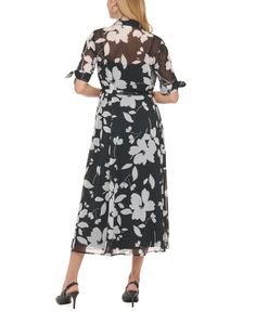 Bring on the blooms in Calvin Klein's midi shirtdress. Formal Floral Print Shirt Dress For Summer, Elegant Black Short Sleeve Shirt Dress, Spring Black Formal Shirt Dress, Fitted Floral Print Shirt Dress For Formal Occasions, Formal Fitted Floral Print Shirt Dress, Formal Fitted Shirt Dress With Floral Print, Black Shirt Dress For Spring Formal Events, Formal Black Shirt Dress For Spring, Spring Evening A-line Shirt Dress